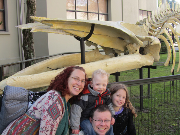 Family portrait in Concepcion (with a prehistoric whale skeleton as a backdrop)