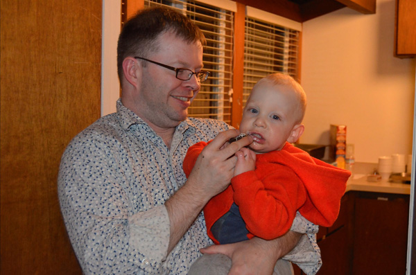 Peter and Sam sampling the ice cream sandwiches at Katie\'s rehersal dinner