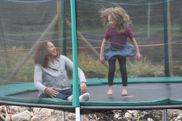 Melissa and Irene take a turn in the trampoline