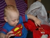 Sam the Anti-Preemie: Opening Judy\'s great gift (cute rain coat!)