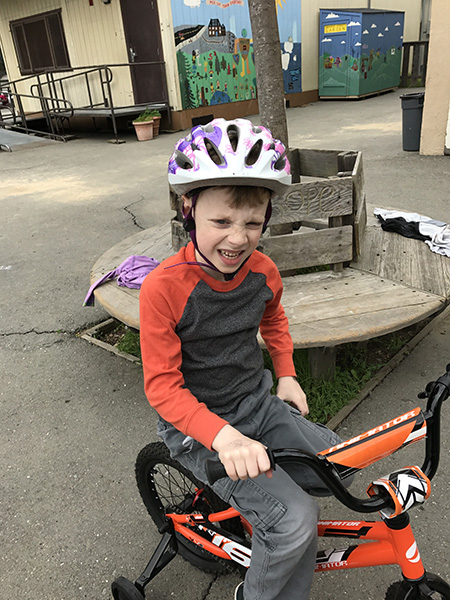 Sam the Anti-Preemie on his bike