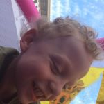 Sam the Anti-Preemie in a bouncy house